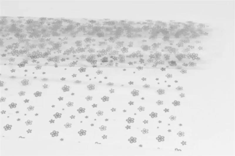 Główne zdjęcie produktu Celofánové archy s potiskem 25my 70x100 cm - lila kvítečka [25 ks]