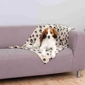 Następne zdjęcie produktu Kocyk polarowy BEANY 100x70cm - beżowy z czarnymi nóżkami