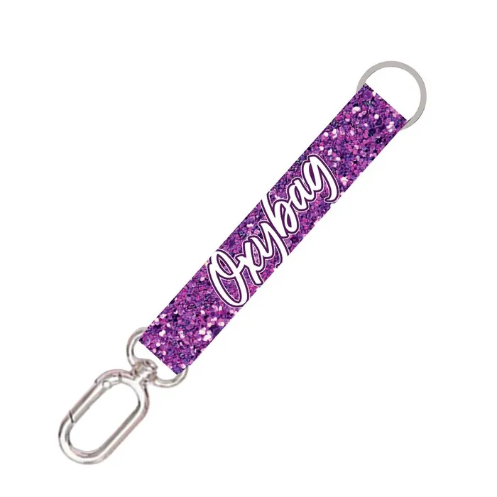 Główne zdjęcie produktu Krátká klíčenka s karabinkou Purple glitter